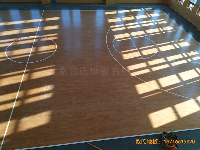 武漢廣阜屯小學(xué)清江錦城分?；@球館運動地板施工案例4